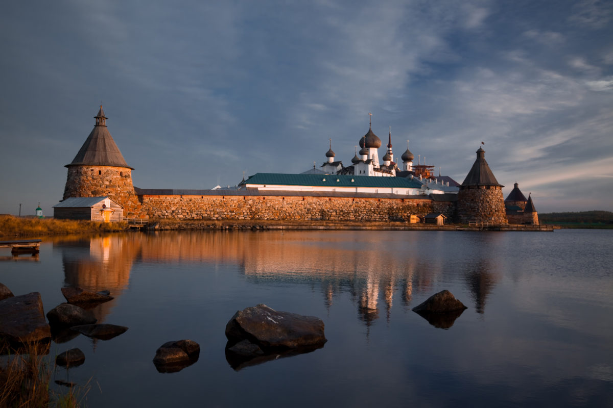 View on Solovetsky Monastery with Holy Lake on sunrise
